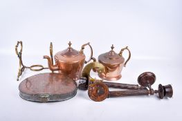 A group of assorted copper and brass items.