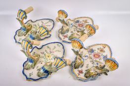 Two pairs of faience Portuguese ceramic wall sconces.