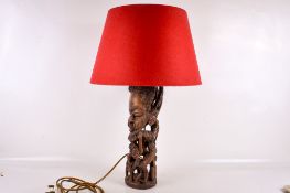 A Malawi East African tribal wood carved 'Tree of Life' table lamp.