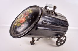 A vintage cast metal coal scuttle.