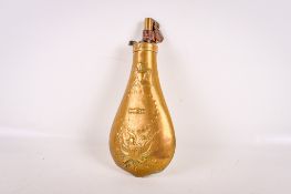 A 'US' brass powder shot flask. Having embossed decoration front and back.