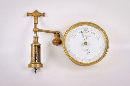 A Victorian style 'Negretti & Zambra' aneroid barometer and mechanical cork screw.