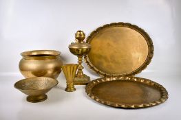 A collection of six assorted brassware items. Including two trays and a oil lamp, etc.