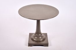 A 20th century wooden table.