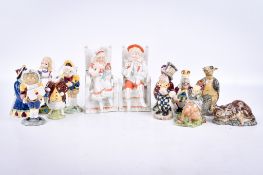 A collection of assorted circa 1974 Beswick 'Alice Series' figures.