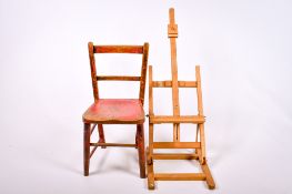A small folding artists' picture easel and a childs' chair.