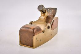 A vintage Sorby brass infill smoothing hand plane.
