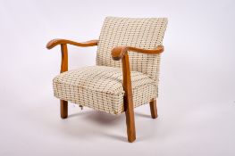 A mid-century Parker Knoll open armchair.