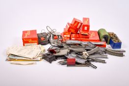 An assortment of 00 gauge model railway layout accessories. Including a boxed pack of Tri-ang R.