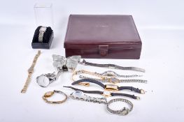 A group of assorted fashion wristwatches.