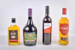 Four bottles of assorted alcohol.