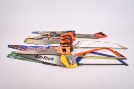 A collection of woodworking and workshop saws. Including examples by Irwin, Max Pro, Workman, etc.