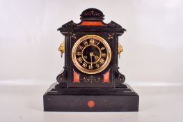 A Victorian slate and marble mantel clock.