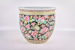 A modern Chinese ceramic gold fish bowl.