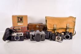 A collection of vintage film cameras.