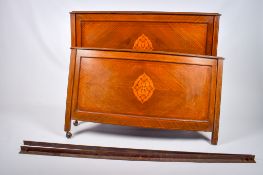 A French mahogany small double bed.