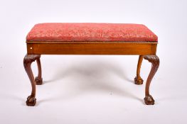 An early 20th century mahogany box seat duet piano stool.