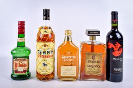 Five bottles of assorted alcohol.