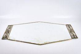 An Art Deco style bevelled edge wall mirror.