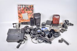 An assortment of Olympus OM camera accessories. To include two 50mm f1.