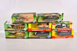 Eight boxed Solido diecast tanks.