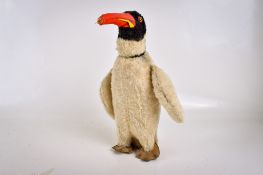 An early 20th century Steiff penguin.