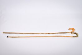 Two assorted shepherd's crooks. One having a carved horn handle.