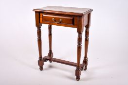 A contemporary mahogany side table.