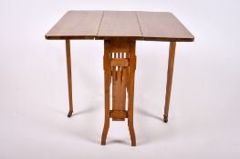 An Edwardian mahogany Sutherland table.