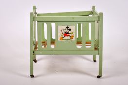 A vintage Mickey Mouse dolls crib.