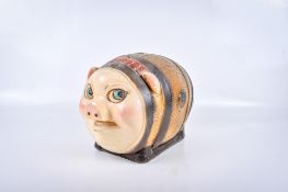 A Guinness branded 'piggy barrel' money box bank. 'RG. 912410.