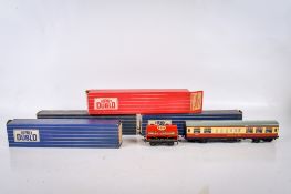 A collection of Hornby Dublo 00 gauge carriages and wagons.