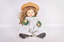 A mid-century Pedigree composite baby doll. Having sleepy eyes, open mouth with two front teeth.