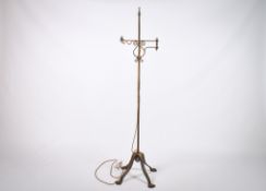 A vintage wrought iron standard lamp base.