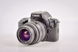 A Canon EOS 1000F N 35mm SLR camera. With a Sigma DL Zoom 35-80mm f4-5.6 lens, optics G.