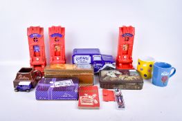 A group of assorted Cadbury's Chocolate vintage branded collectables. Including tins and mugs, etc.