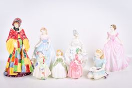 A collection of eight assorted Royal Doulton porcelain figures.