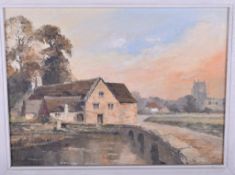 A 20th century oil painting. Signed 'E J Wilson', depicting a cottage beside a river, 16.5cm x 22.