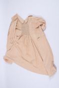 A 19th century farmer's or shepherd's pink linen smock.
