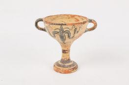 A Greek twin-handled cup in the Minoan manner.