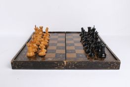 A fruitwood Staunton chess set and a Chinese folding games box.