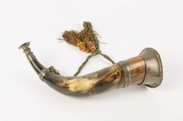 A 19th century cow horn hunting horn.