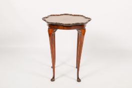 An early 20th century walnut occasional table.