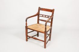 A 19th century mahogany elbow chair.