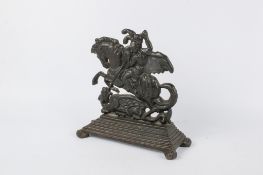 A Victorian cast iron doorstop.