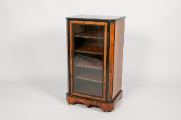 A Victorian ebonised burr walnut pier music cabinet.