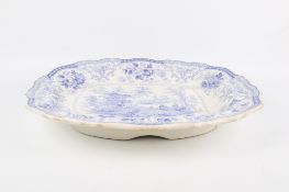 A large 19th century stone china meat dish with reservoir.