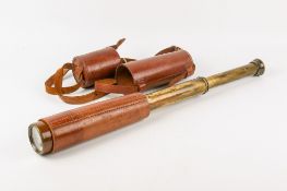 An early 20th century B C & Co. Ltd military brass and leather bound four draw telescope. No. 6096.