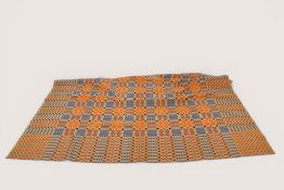 A traditional Welsh reversible woollen blanket.
