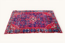 A 20th century Persian rug.